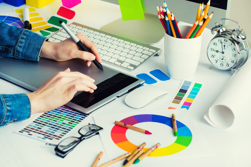 Young Graphic Designer Using a Tablet