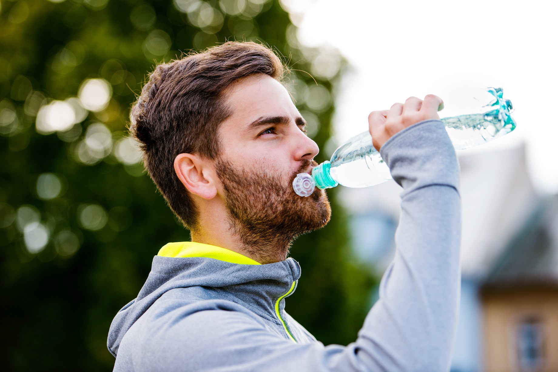 A runner with a bottle of custom labeled water